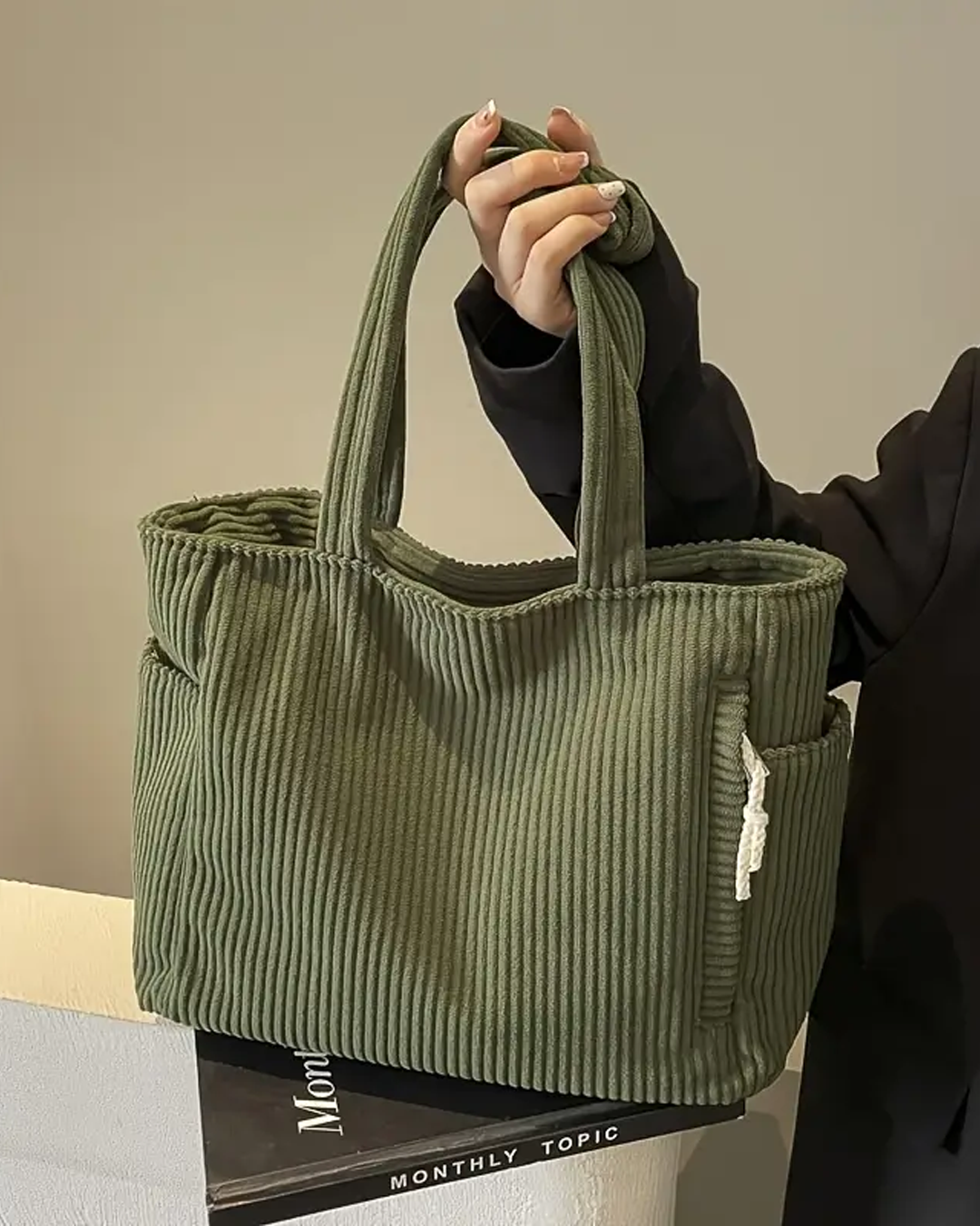 Lovera | Ribbad tygväska med dragskodetalj