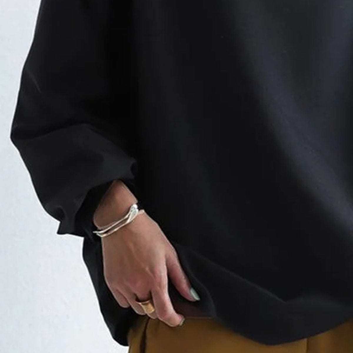 Elly – Mjuk stickad topp med hög krage